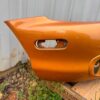 OEM factory front bumper cover for a 1999–2000 Mazda MX-5 Miata (NB generation)