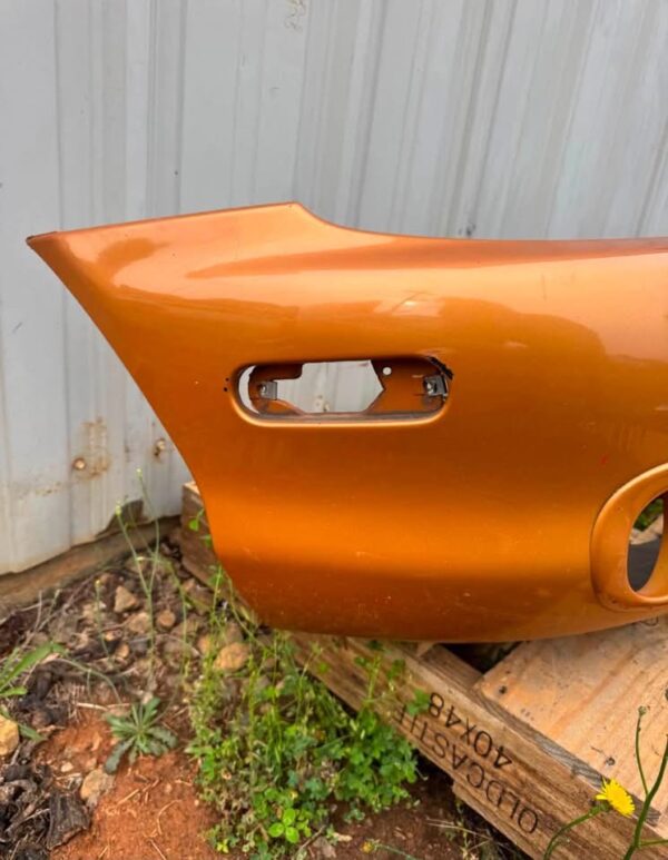 OEM factory front bumper cover for a 1999–2000 Mazda MX-5 Miata (NB generation)