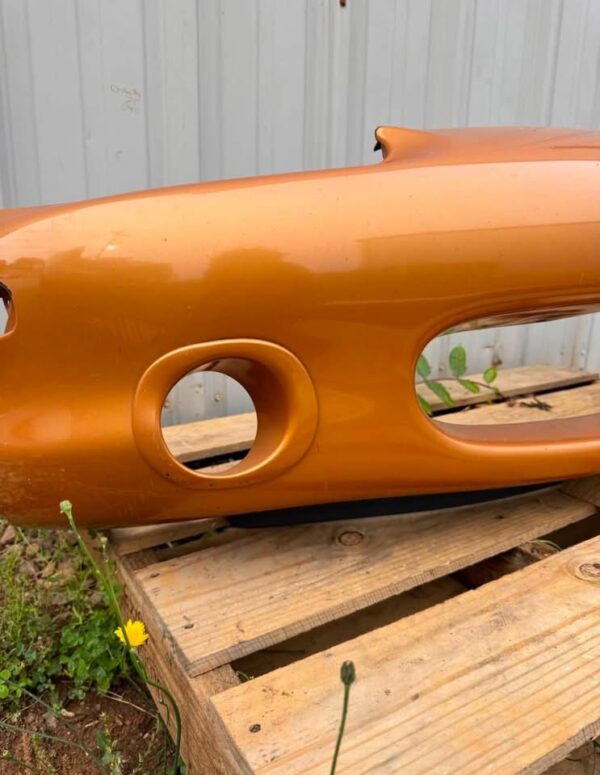 OEM factory front bumper cover for a 1999–2000 Mazda MX-5 Miata (NB generation)