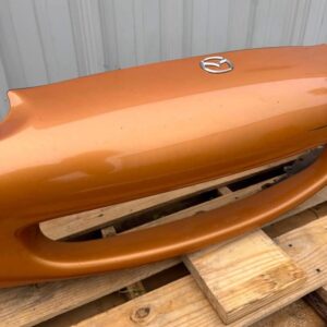 OEM factory front bumper cover for a 1999–2000 Mazda MX-5 Miata (NB generation)