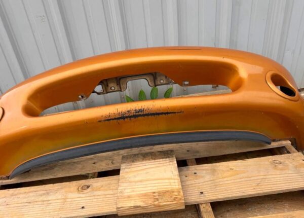 OEM factory front bumper cover for a 1999–2000 Mazda MX-5 Miata (NB generation)