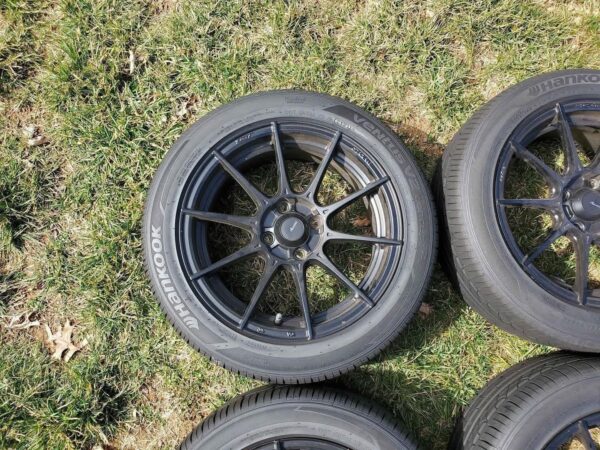 Konig Matte Black Multi-Spoke Wheels Wrapped in Hankook Ventus V2 Concept 2 Tires (Set of 4)