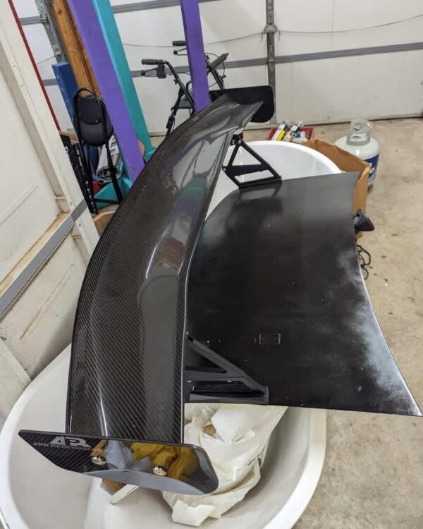 Used APR Performance GTC-200 Carbon Fiber Wing mounted to a Mazda Miata NA/NB Trunk Lid.