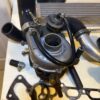 Custom 1.6L NA Mazda Miata Turbo Charger Upgrade Kit featuring a BEGi / Cartech hardware combination.