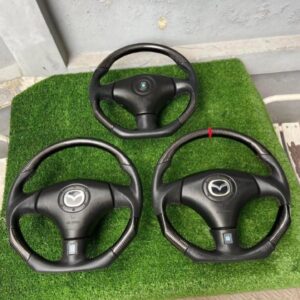 IMG_8414 Custom Carbon Fiber Flat-Bottom Steering Wheels for Mazda Vehicles (such as the RX-7 FD and Miata NB).
