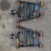 Aftermarket tubular adjustable front lower control arms featuring polyurethane bushings.