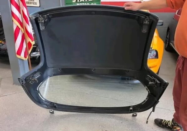 Crystal Blue OEM Hardtop for a Mazda MX-5 Miata (NA/NB generation).