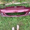 IMG_8528 OEM Factory Front Bumper Cover for a Mazda MX-5 Miata NB (specifically the facelifted Mk2.5 / NBFL model spanning 2001–2005)