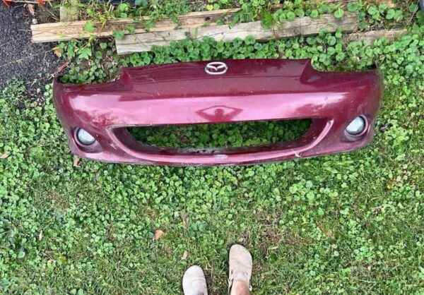 IMG_8528 OEM Factory Front Bumper Cover for a Mazda MX-5 Miata NB (specifically the facelifted Mk2.5 / NBFL model spanning 2001–2005)