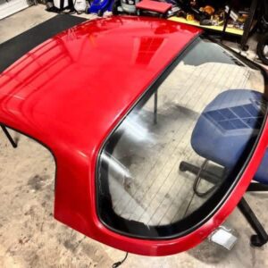 IMG_8895 Mazda MX-5 Miata OEM removable hardtop finished in Classic Red.