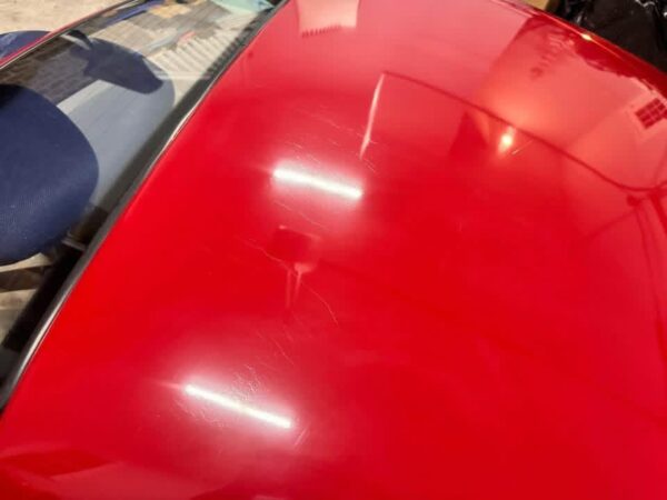 Mazda MX-5 Miata OEM removable hardtop finished in Classic Red.