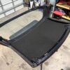 Mazda MX-5 Miata OEM removable hardtop finished in Classic Red.