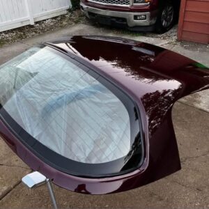 Mazda MX-5 Miata OEM removable hardtop finished in a factory Merlot / Mahogany Mica paint.