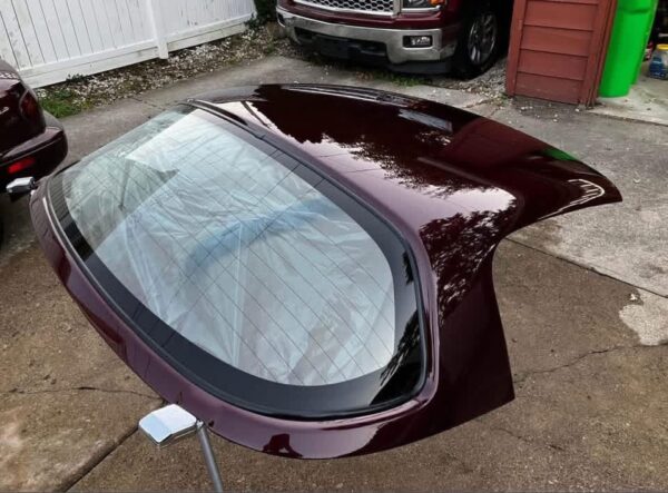 Mazda MX-5 Miata OEM removable hardtop finished in a factory Merlot / Mahogany Mica paint.
