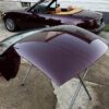 Mazda MX-5 Miata OEM removable hardtop finished in a factory Merlot / Mahogany Mica paint.