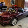 Mazda MX-5 Miata OEM removable hardtop finished in a factory Merlot / Mahogany Mica paint.