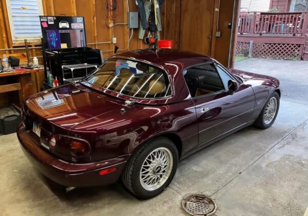 Mazda MX-5 Miata OEM removable hardtop finished in a factory Merlot / Mahogany Mica paint.