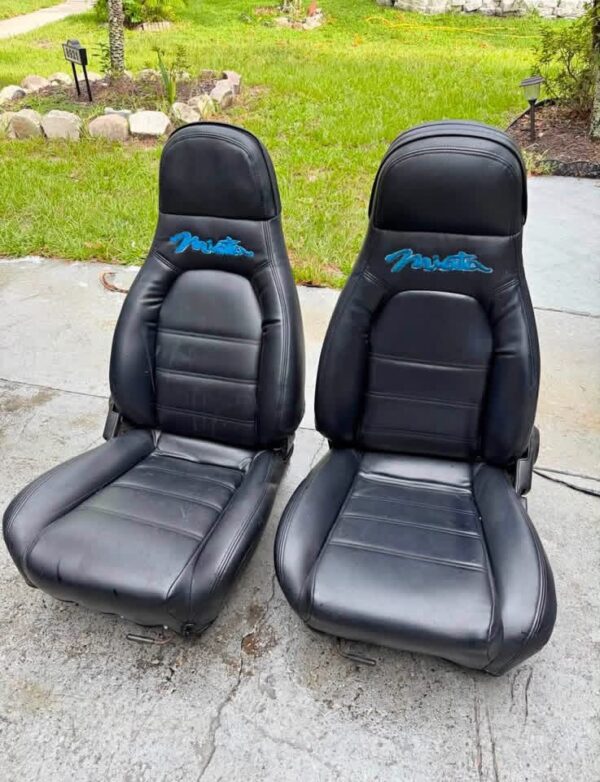IMG_1785 OEM Mazda MX-5 Miata NA (1990–1997) Front Bucket Seats Pair – Black Leatherette with Teal Miata Logo