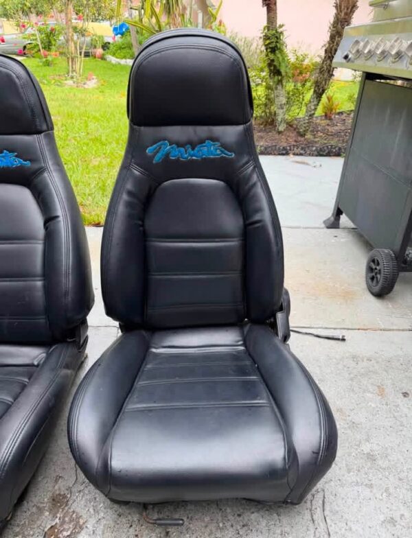 IMG_1787 OEM Mazda MX-5 Miata NA (1990–1997) Front Bucket Seats Pair – Black Leatherette with Teal Miata Logo