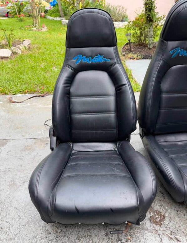 IMG_1788 OEM Mazda MX-5 Miata NA (1990–1997) Front Bucket Seats Pair – Black Leatherette with Teal Miata Logo