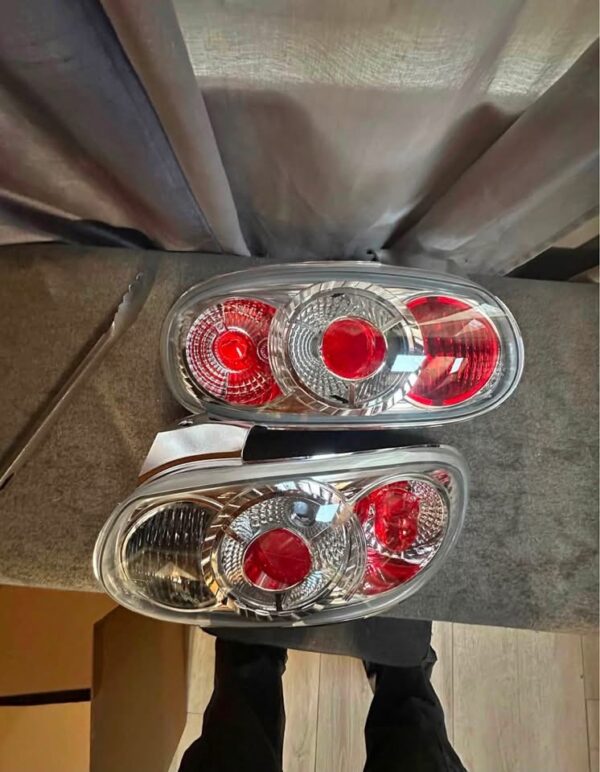 Pair of OEM Mazda MX-5 Miata (NB generation, specifically NB2 / 2001–2005) Clear Tail Lights / Taillights (often referred to as Altezza-style or factory clear-lens rear combination lamps).