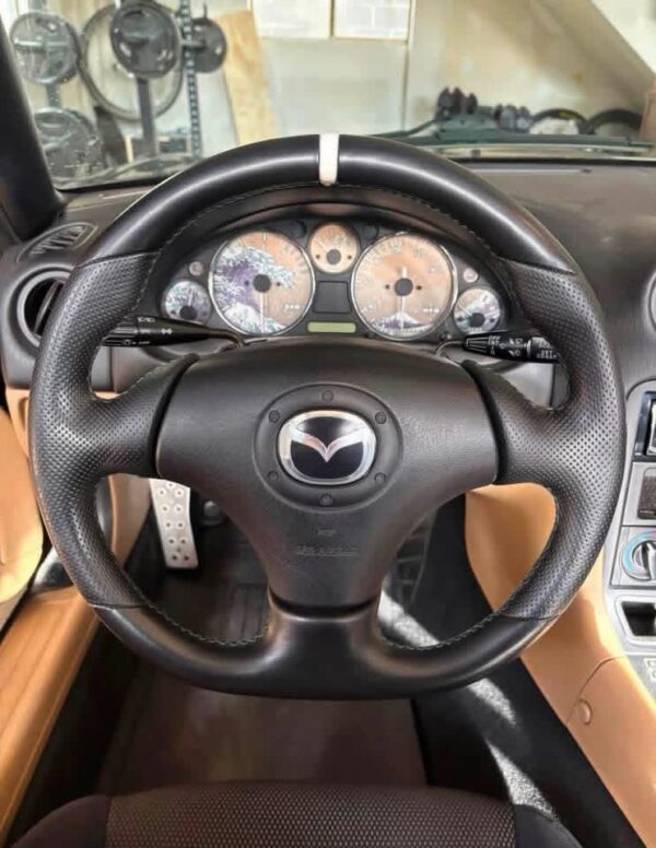 Guardian Designs steering wheel for the 1999-2005 NB Miata that works with the stock airbag.