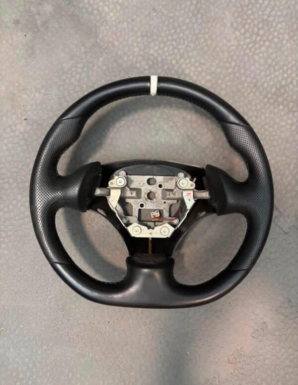 Guardian Designs steering wheel for the 1999-2005 NB Miata that works with the stock airbag.