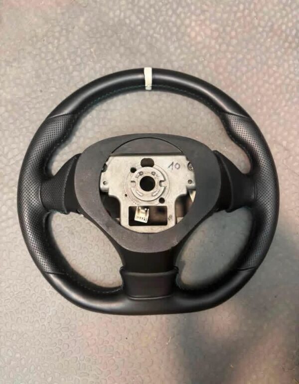 Guardian Designs steering wheel for the 1999-2005 NB Miata that works with the stock airbag.