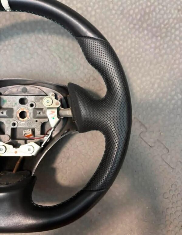 Guardian Designs steering wheel for the 1999-2005 NB Miata that works with the stock airbag.