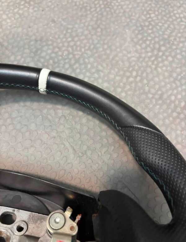 Guardian Designs steering wheel for the 1999-2005 NB Miata that works with the stock airbag.