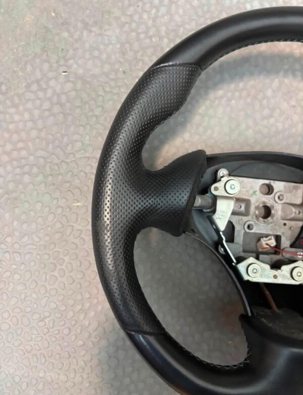 Guardian Designs steering wheel for the 1999-2005 NB Miata that works with the stock airbag.