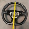 Guardian Designs steering wheel for the 1999-2005 NB Miata that works with the stock airbag.