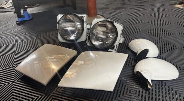 Screenshot OEM Mazda MX-5 Miata NA Pop-Up Headlight & Manual Mirror Set (White)