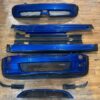 IMG_7921 Complete OEM Mini Cooper (R50/R52/R53 generation) John Cooper Works (JCW) Aerodynamic Body Kit finished in metallic blue (Hyper Blue).