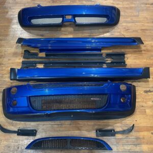 IMG_7921 Complete OEM Mini Cooper (R50/R52/R53 generation) John Cooper Works (JCW) Aerodynamic Body Kit finished in metallic blue (Hyper Blue).