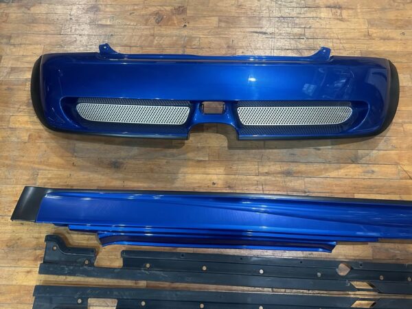 IMG_7925 Complete OEM Mini Cooper (R50/R52/R53 generation) John Cooper Works (JCW) Aerodynamic Body Kit finished in metallic blue (Hyper Blue).