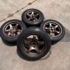 IMG_8267 RAYS Gram Lights 57DR Bronze Wheels w/ Performance Tires (Set of 4)