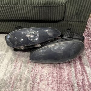 Screenshot OEM Mazda MX-5 Miata NB (1999–2005) Smoked Headlight Assembly Set – Left & Right – Used